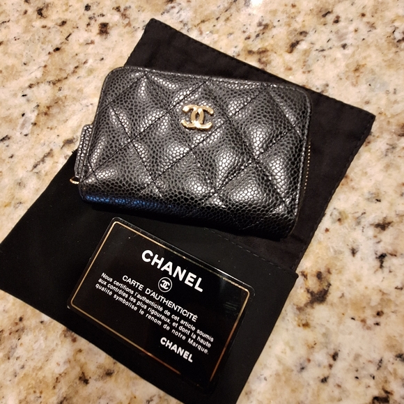 CHANEL Handbags - Chanel black caviar leather zip O Coin purse with card slots